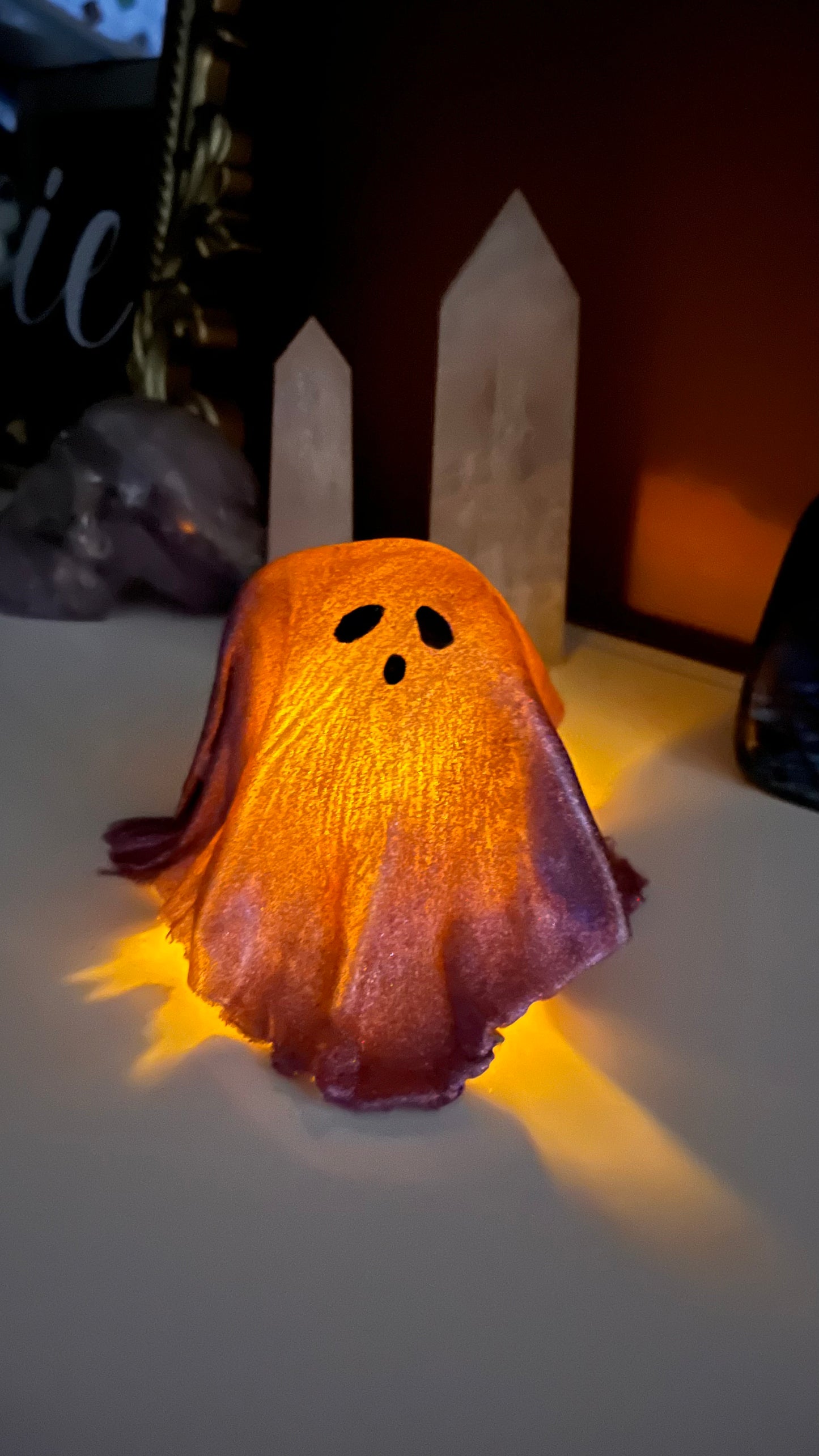 Pink Holographic Ghost